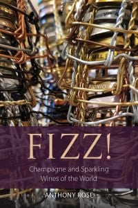 Book cover of Anthony Rose's guide Fizz! Champagne and Sparkling Wines of the World, with three piles of wire cage bottle tops. Published by Academie du Vin Library.