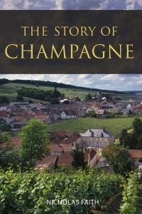Book cover of Nicholas Faith's guide, The Story of Champagne, with a view a vineyards and roof tops in the distance. Published by Academie du Vin Library.