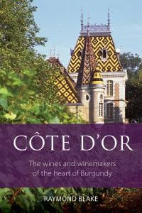 Book cover of Raymond Blake's guide, Côte d'Or, The Wines and Winemakers of the Heart of Burgundy, with the Chateau de Corton Andre, with vineyards in front. Published by Academie du Vin Library.