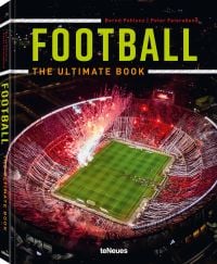 Aerial view of football stadium with red flares and ribbons, on cover of Football: The Ultimate Book, by teNeues Books.