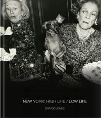 Book cover of New York: High Life / Low Life, with dachshunds fighting over canapes, Barbetta, New York, 1990, with Brooke Astor. Published by ACC Art Books.