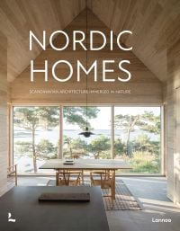 Book cover of Nordic Homes: Scandinavian Architecture Immersed in Nature, with a long residential home with large windows. Published by Lannoo Publishers.