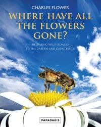Book cover of Charles Flower's Where Have All the Flowers Gone? Restoring Wild Flowers to the Countryside, with a honey bee sitting on daisy, blue sky behind. Published by Papadakis.