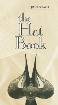 Book cover of The Hat Book with a horn-shaped hat covering a model's eyes. Published by Papadakis.