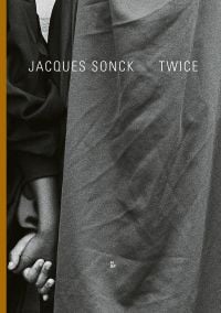 Book cover of Twice: Jacques Sonck, with two figures holding hands. Published by Hopper&Fuchs.