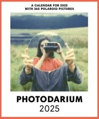 Calendar cover of Photodarium 2025, featuring a photographer taking a picture with a polaroid camera of a person holding a round mirror in front of their face, with the photographer's reflection in it. Published by Seltmann Publishers.