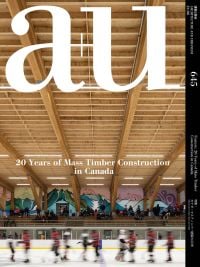 Book cover of a+u 24:06, 645: Feature: 20 Years of Mass Timber Construction in Canada, with the wooden room of an ice hockey building. Published by Shinkenchiku-Sha Co., Ltd.