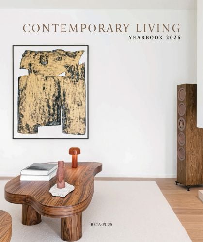 Book cover of Contemporary Living Yearbook 2026: featuring an interior with white walls, dark wood table and speaker stack. Published by Beta-Plus.