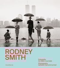 Book cover of Rodney Smith: Photography Between Real and Surreal; featuring five figures holding umbrellas, looking out across the water at New York skyline, with their backs to the viewer. Published by Silvana.