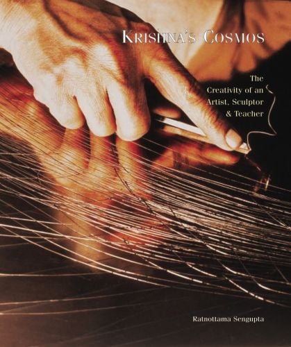 Book cover of Krishna's Cosmos: The Creativity of an Artsist, Sculptor & Teacher, with a hand scraping lines on a metal sheet. Published by Mapin Publishing.