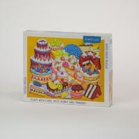 Puzzle box of Plate with Cake, Jelly Donut and Tiramisu: 1000 piece puzzle. Published by Kinstler.