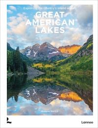 Book cover of Great American Lakes: Exploring the Country's Inland Waters; featuring a breath-taking mountain landscape with lake below. Published by Lannoo Publishers.