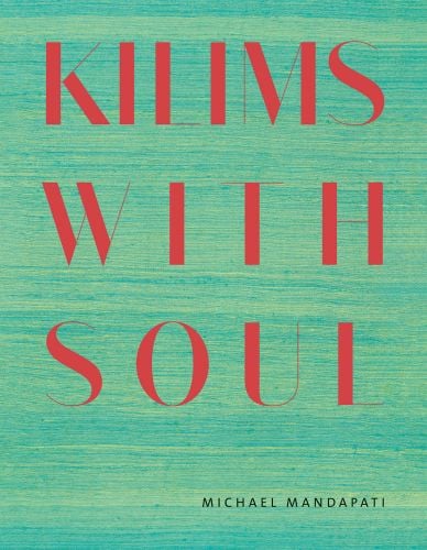 Book cover of Kilims: Warp & Weft, with red woven fabric. Published by Hali Publications.