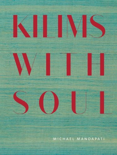Book cover of Kilims: Warp & Weft, with red woven fabric. Published by Hali Publications.