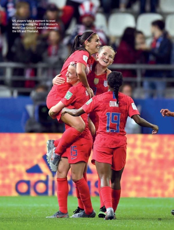 Book cover of Megan Rapinoe, featuring the footballer in action on the pitch for the U.S national soccer team. Published by Abbeville Press.