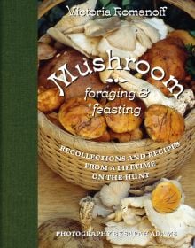 Basket of gold and white mushrooms on table, Mushroom Foraging and Feasting in white font, green border to left.