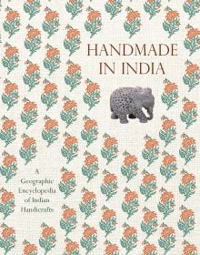 Book cover of Handmade in India: A Geographic Encyclopedia of Indian Handicrafts, with a ceramic elephant, and floral print. Published by Abbeville Press.