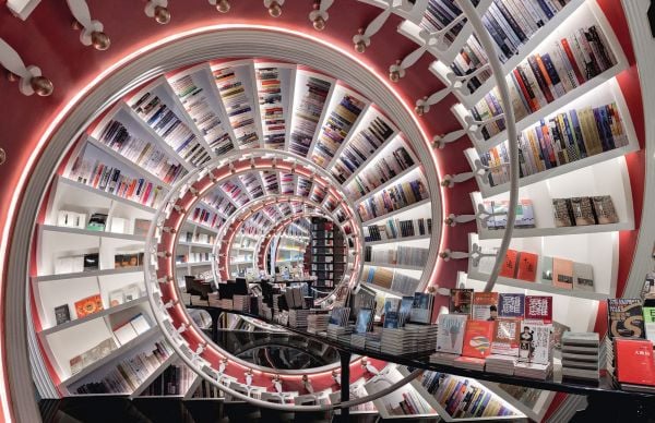 Book cover of Bookstores of the World; featuring the interior of a large bookshop. Published by Abbeville Press.