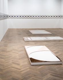 Book cover of Walead Beshty's Addenda to a Sequence of Appearances: Walead Beshty Studios Inc. at Dane Chantala Associates Ltd., 2009–2022, with long canvases on floor of exhibition space. Published by Hurtwood Press Ltd.