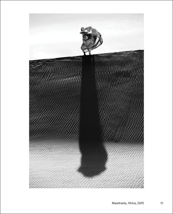 Book cover of Collecting the World, featuring a photo capturing a figure jumping off edge of brick structure into sea below. Published by Hurtwood Press Ltd.