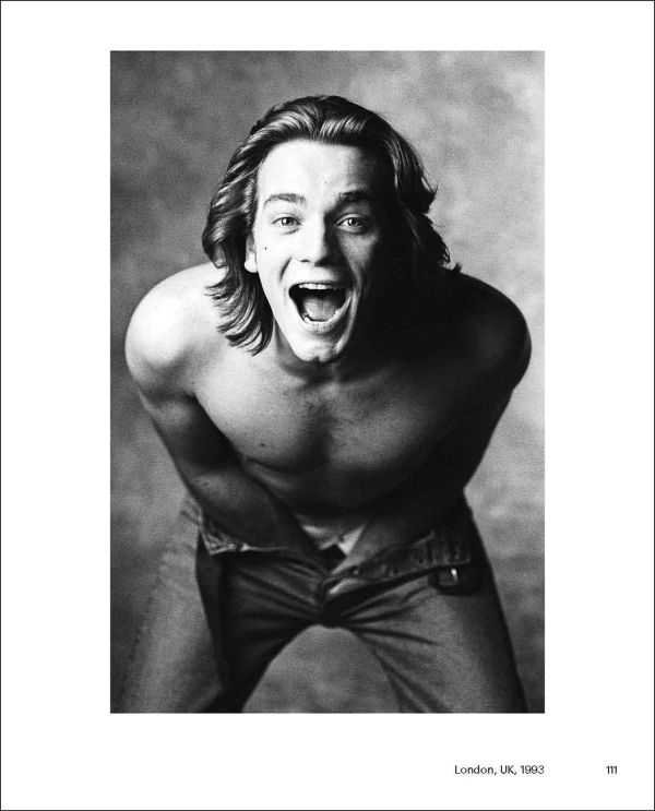 Book cover of Collecting the World, featuring a photo capturing a figure jumping off edge of brick structure into sea below. Published by Hurtwood Press Ltd.