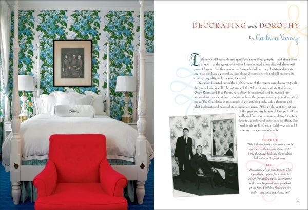 Dark green wall interior with ornate gold mirror, white fire place, floral curtains and cream lamps with Romance and Rhododendrons in white and pink font above