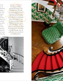 Dark green wall interior with ornate gold mirror, white fire place, floral curtains and cream lamps with Romance and Rhododendrons in white and pink font above