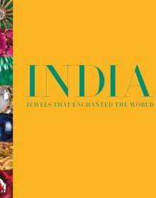 Book cover of 'India, Jewels that Enchanted the World', featuring seven individual colored jewels down left edge. By World Diamond Museum.