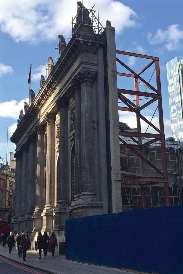 Book cover of The Gentle Author's The Creeping Plague of Ghastly Facadism, with front of brick building with windows. Published by Spitalfields Life Books Ltd.