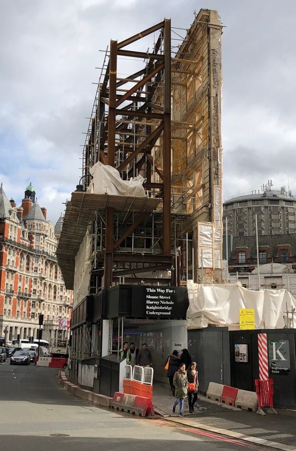 Book cover of The Gentle Author's The Creeping Plague of Ghastly Facadism, with front of brick building with windows. Published by Spitalfields Life Books Ltd.