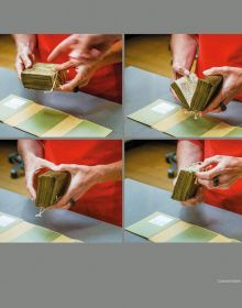 Group of people looking through large library books, on grey cover, Photographing Shakespeare in gold font below