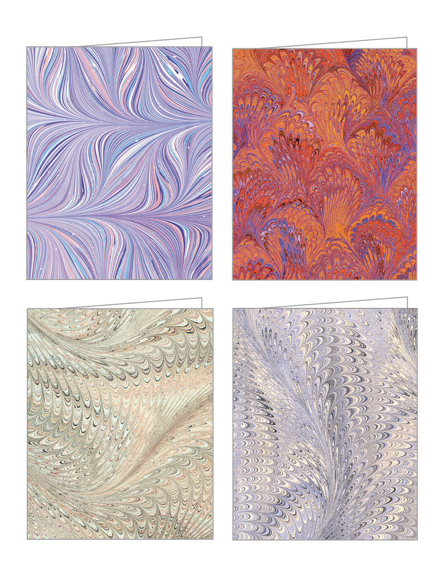 Marbled feather like lined pattern in pink, blue and white covering notecard box
