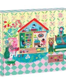 Notecard box of We Are Family QuickNotes, with a bear dressed in yellow striped dungarees, next to house with two moles sitting in chairs. Published by teNeues Stationery.