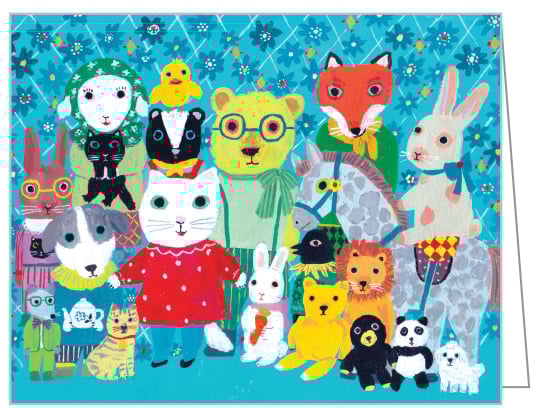 Notecard box of We Are Family QuickNotes, with a bear dressed in yellow striped dungarees, next to house with two moles sitting in chairs. Published by teNeues Stationery.