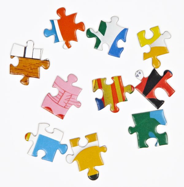 Puzzle box cover of Mid-Century Mod! 1000-Piece Puzzle, featuring Shelley Davis's bold modern furniture design artwork. Published by teNeues Stationery.