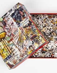 Puzzle box of Brooklyn, NY 1000-Piece Puzzle, featuring a Graphic style artwork of the streets of Brooklyn. Published by teNeues Stationery.
