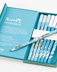 Impressionist artwork on pen-set case of 'Fishing Boats, Claude Monet 8-Pen Set', by teNeues Stationery.