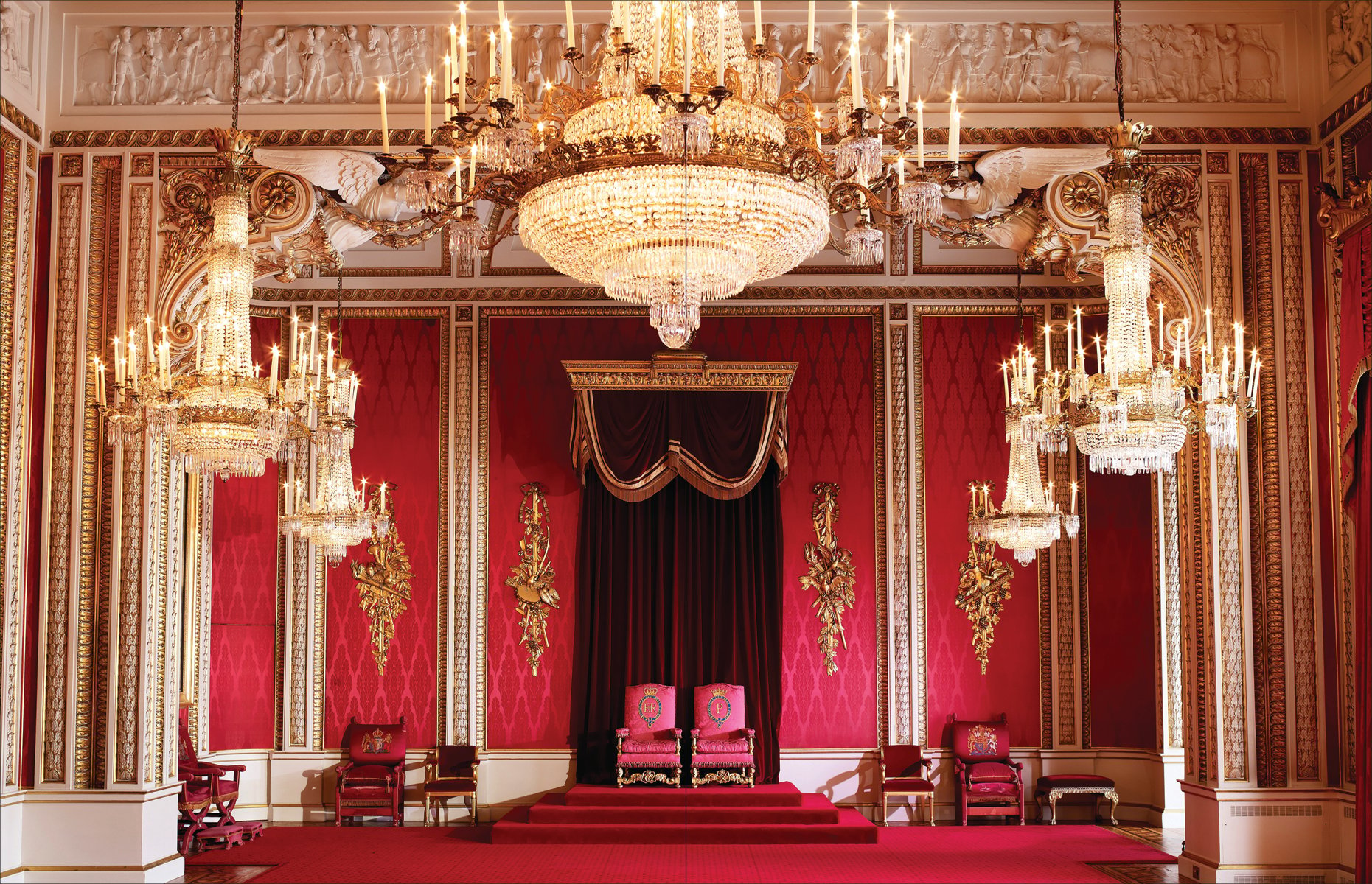 Front of Buckingham Palace, Union Jack flying, changing of guard, Buckingham Palace Official Souvenir in black and gold font above