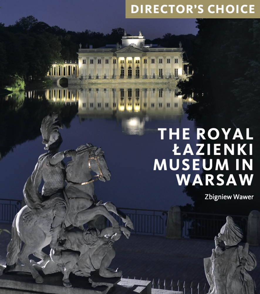 Atmospheric shot of Royal Lazienki Museum illuminated at night with grey horse and rider statue in foreground with lake in-between and The Royal Lazienki Museum in Warsaw in white font