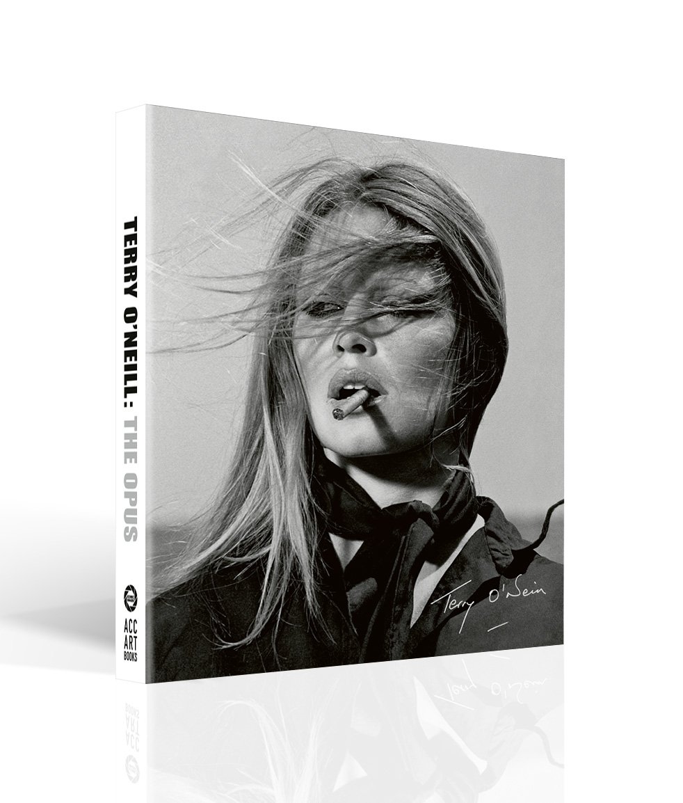 Bridgitte Bardot with windswept hair, smoking, on cover of 'Terry O’Neill, The Opus', by ACC Art Books.