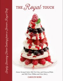 Eton Mess. Meringue tower with cherries and raspberries, on white cover of 'The Royal Touch', by ACC Art Books.