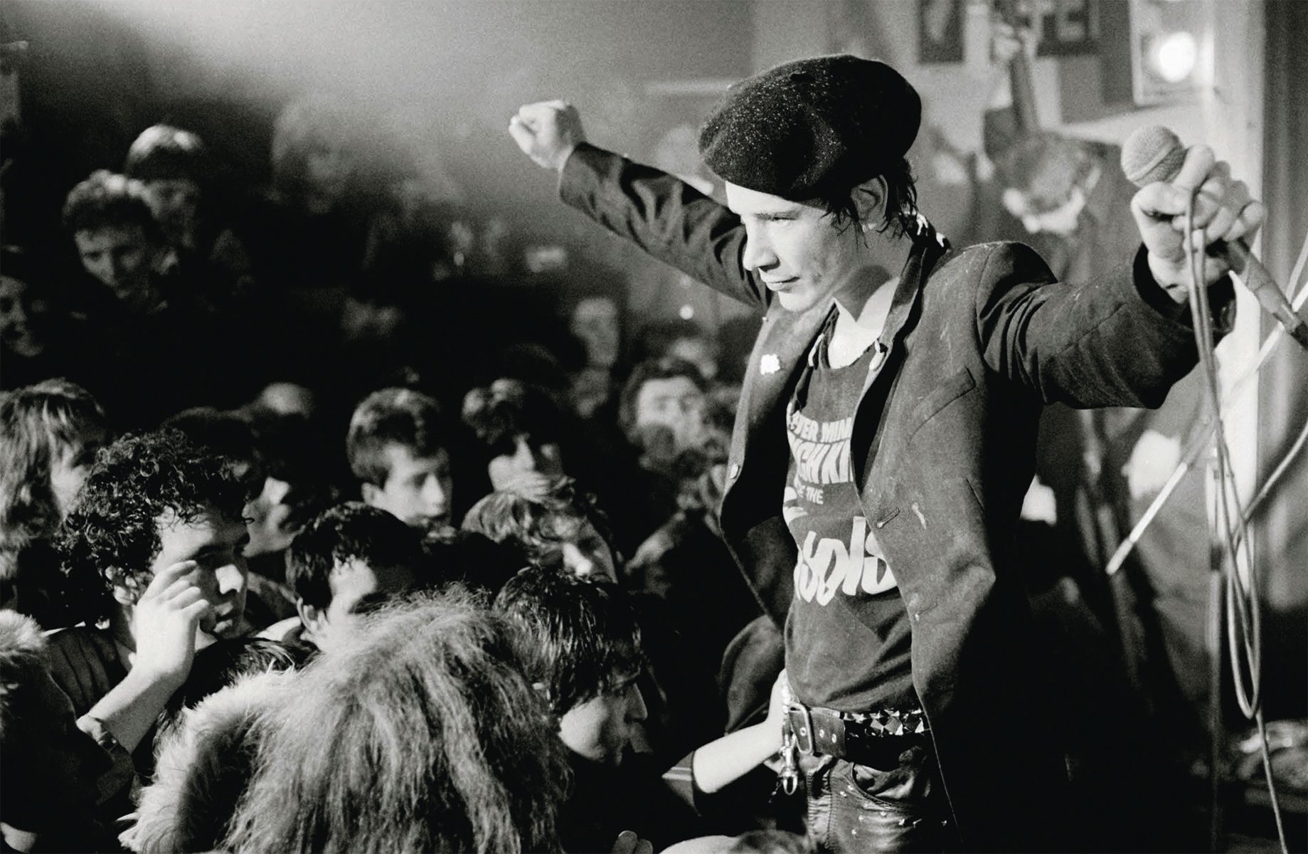 Johnny Rotten and Sid Vicious on stage at Ivanhoe's in Huddersfield, on cover of 'Sex Pistols The End is Near 25 12 77', by ACC Art Books.