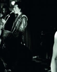 Book cover of Sex Pistols The End is Near 25 12 77, featuring Johnny Rotten and Sid Vicious on stage at Ivanhoe's in Huddersfield. Published by ACC Art Books.