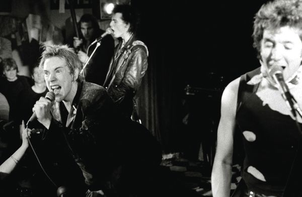 Book cover of Sex Pistols The End is Near 25 12 77, featuring Johnny Rotten and Sid Vicious on stage at Ivanhoe's in Huddersfield. Published by ACC Art Books.