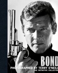 Book cover of Bond: Photographed by Terry O'Neill', featuring Roger Moore as James Bond, holding silver gun. Published by ACC Art Books.