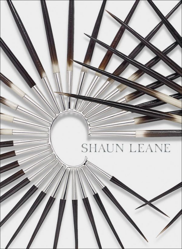Book cover of Shaun Leane, with a large metal and wood spike ear cuff. Published by ACC Art Books.