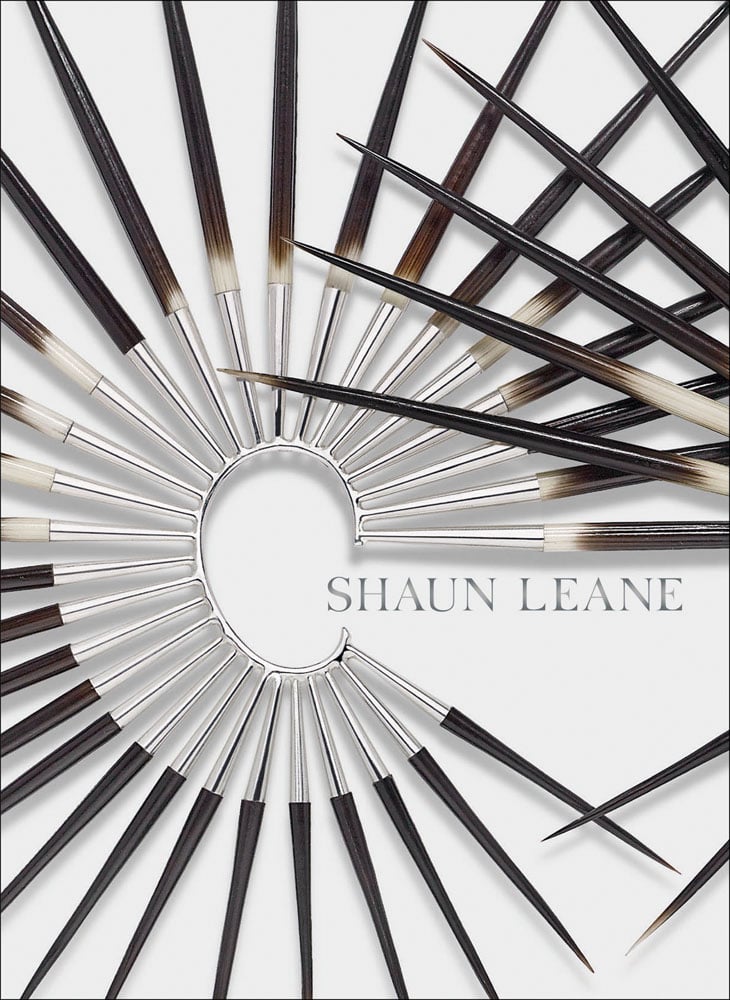 Book cover of Shaun Leane, with a large metal and wood spike ear cuff. Published by ACC Art Books.