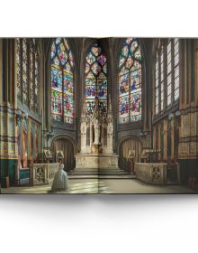 Gothic interior of Sainte-Chapelle in Paris, stained glass windows with fleurs de lys ceiling decoration, to cover of 'Churches of Paris', by ACC Art Books.
