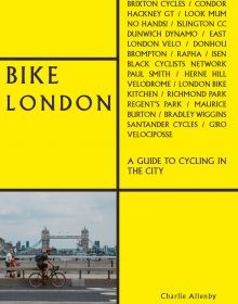 Cyclist riding over bridge in London, on yellow cover of 'Bike London' by ACC Art Books.