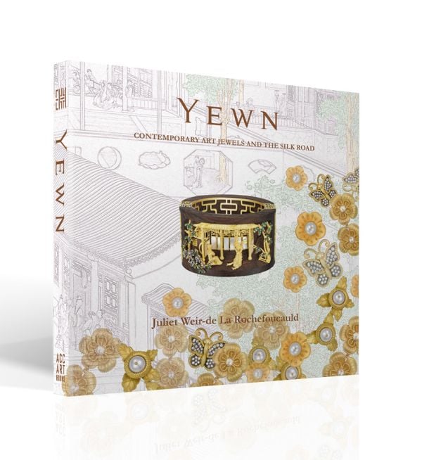 Book cover of Yewn: Contemporary Art Jewels and the Silk Road, featuring a reclaimed wood bangle, with yellow Sapphire set in 18K yellow gold. Published by ACC Art Books.